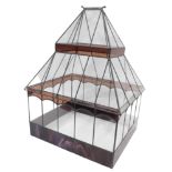 A leaded glass terrarium, the base with purple marbled stained glass panels with an arched roof, 65c