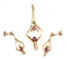 A 9ct gold pendant and earring set, the Art Nouveau style pendant set with garnet, topaz, citrine an