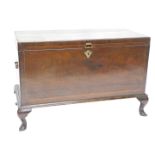 A mahogany chest in George III style, the rectangular top with a cross banded boxwood strung border,