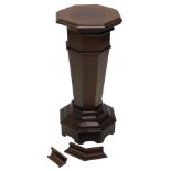 An early 20thC mahogany pedestal, with an octagonal top, tapering column and stepped base, 66cm high