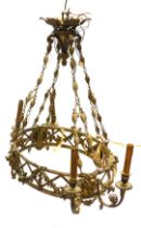 An unusual Continental gilt metal light fitting, of oval form with two pairs of candle arms to each
