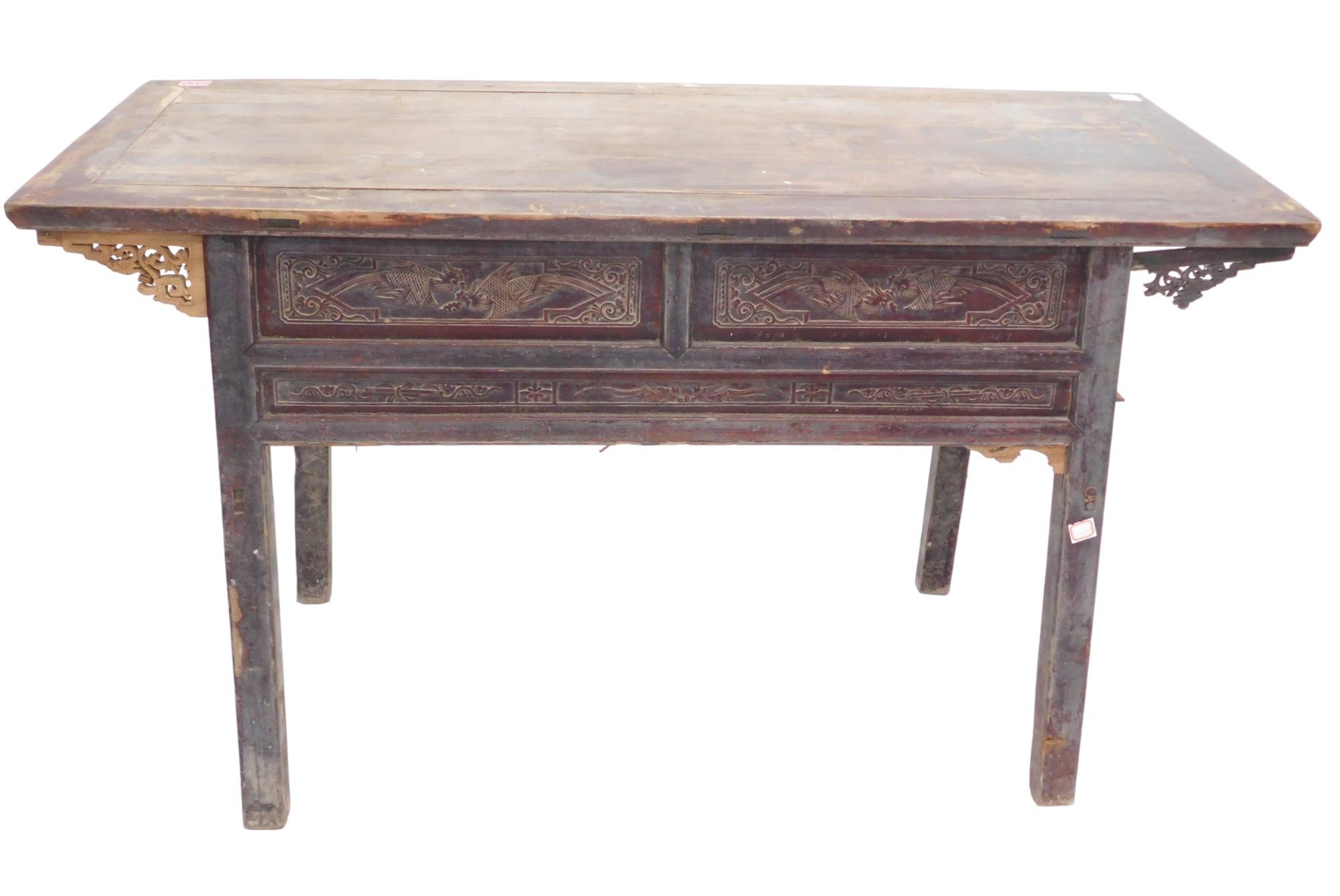 A Chinese red stained altar table, with rectangular planked top above two short drawers, on plain su