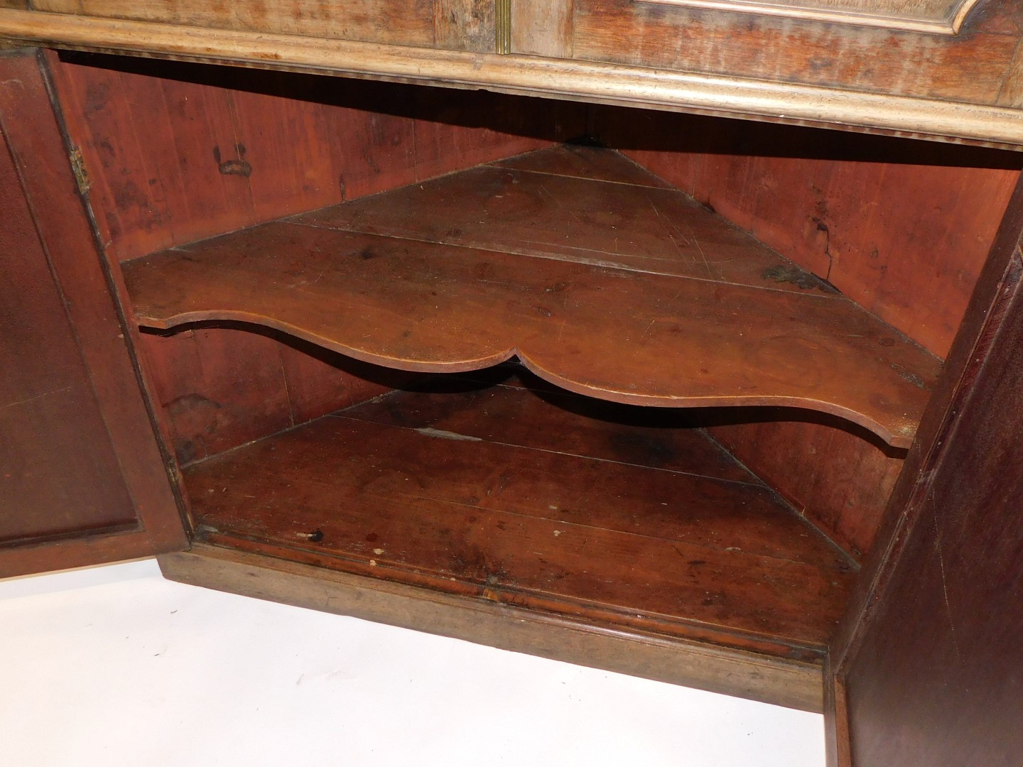 A George III mahogany standing corner cabinet, of breakfront form, with a dental cornice, above two - Image 2 of 3