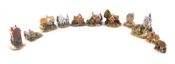 A quantity of Lilliput Lane cottages, to include Up Up and Away, The Coach and Horses, etc. (AF)