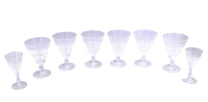 A set of six Waterford wine glasses, each with a cut tapering bowl, 14cm high, and two smaller glass