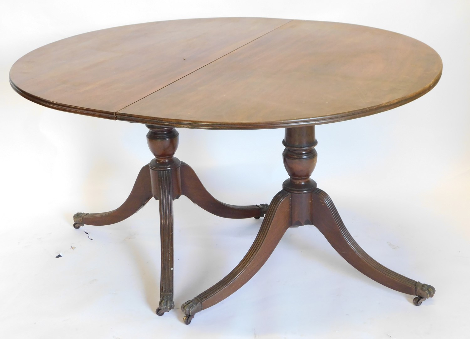 A Regency style mahogany extending dining table, the rectangular top with rounded ends and a moulded - Image 3 of 3