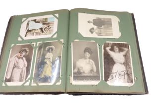 A mid to late 20thC postcard album, containing black and white Foulsham Banfield and other postcards