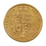 A Queen Victoria shield back half gold sovereign, inverted, dated 1883.