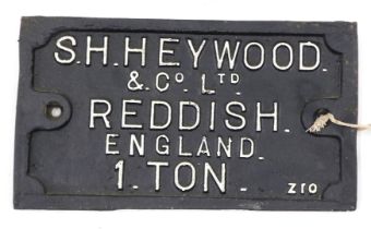 A cast iron railway plaque, bearing name S.H. Heywood and Co Limited Reddish, England one ton, 24cm