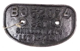 A British Rail cast iron railway wagon plaque, stamped B352074 32T Shildon 1966, 28cm wide.