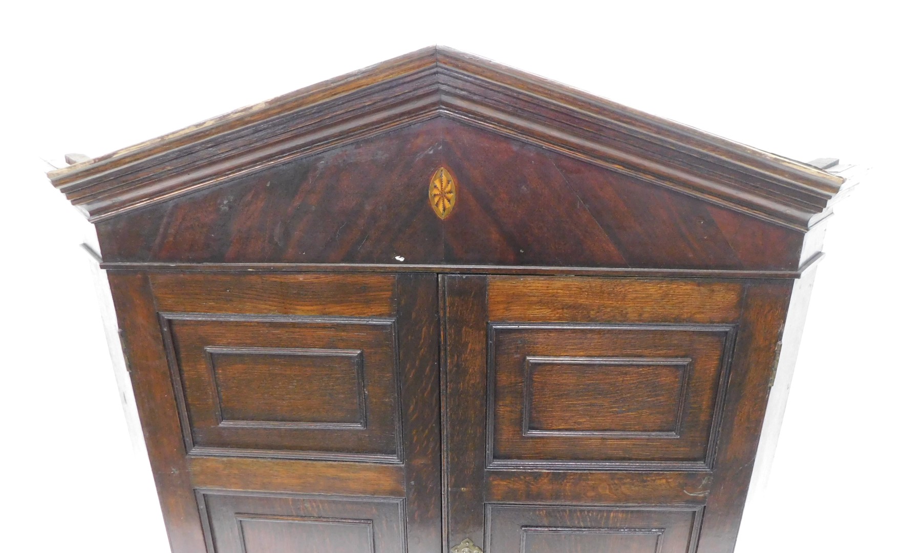 A early 19thC oak and mahogany corner cabinet, the arched cornice above two panelled doors, each lat - Image 2 of 3