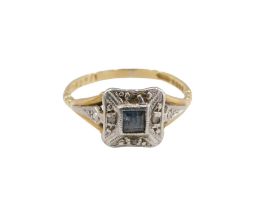 An 18ct gold sapphire and diamond Art Deco style dress ring, the square cut sapphire in rub over set