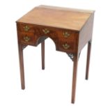 An 19thC mahogany and chequer banded clerk's desk, the slope top enclosing a vacant interior above a
