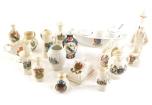 A quantity of crested china, to include WWI soldier, a light house, a boat shaped cruet, etc.