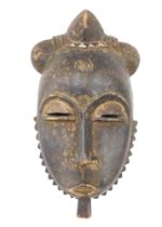 Tribal Art. Baule/Baoule tribe, Mblo classic portrait mask with elegant traditional coiffure, collec