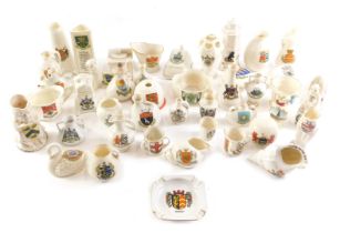 A collection of crested china, to include a light house, a monkey seated on a throne, a toby jug, ca