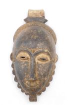 Tribal Art. Baule/Baoule tribe, Mblo classic portrait mask with simple humble coiffure, collected fr