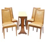 A G-Plan teak drop leaf table, on end supports, and four chairs, each with brown leather backs and s