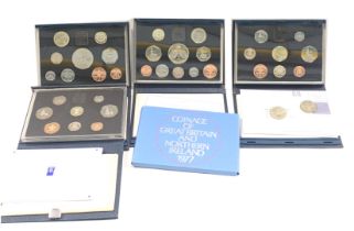 Five Great Britain and Northern Ireland coin packs, comprising 1977, 1997, 1996, 1995, and 1990, box