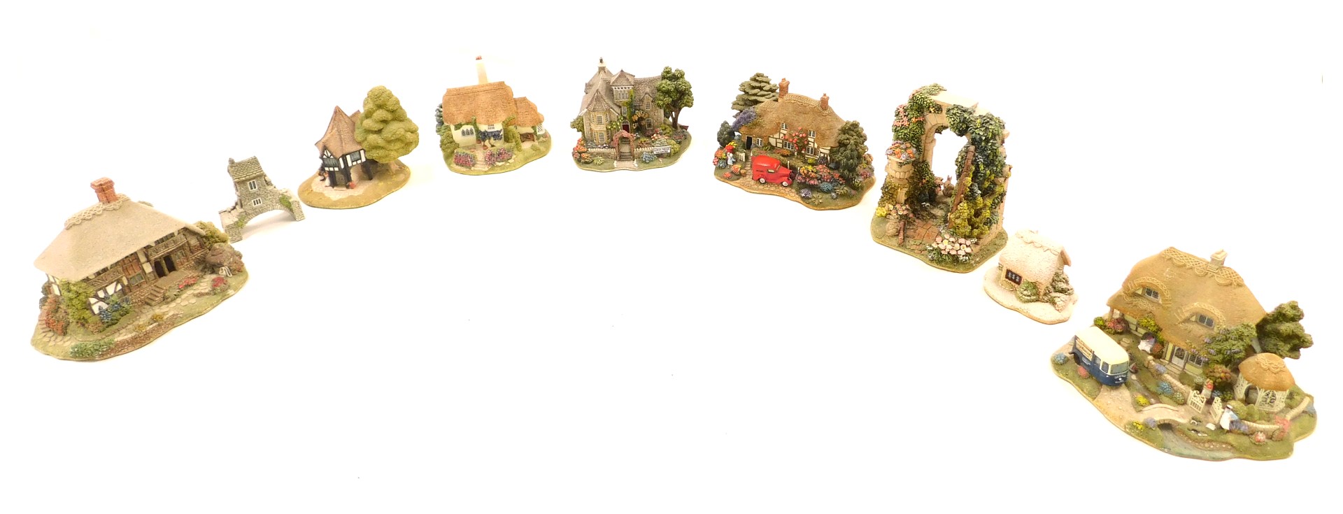 A collection of Lilliput Lane cottages, to include Old Shop at Bignor, Nature's Doorway, Pen Pals, e