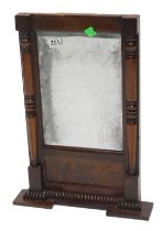 A 19thC mahogany overmantle mirror, the inverted break front cornice with a gadrooned border, the re