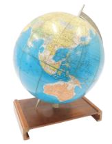 A Rand McNally world globe, made in the USA, on associated plinth, 30cm wide.