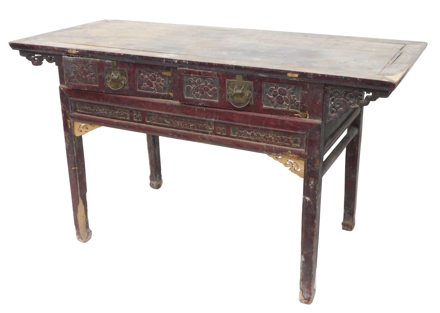 A Chinese red stained altar table, of planked top, with two carved frieze drawers with brass handles