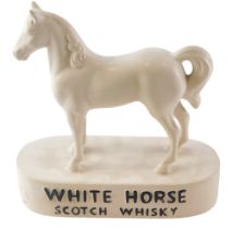 A Kelsboro White Horse Scotch Whisky advertising figure, 22cm high.