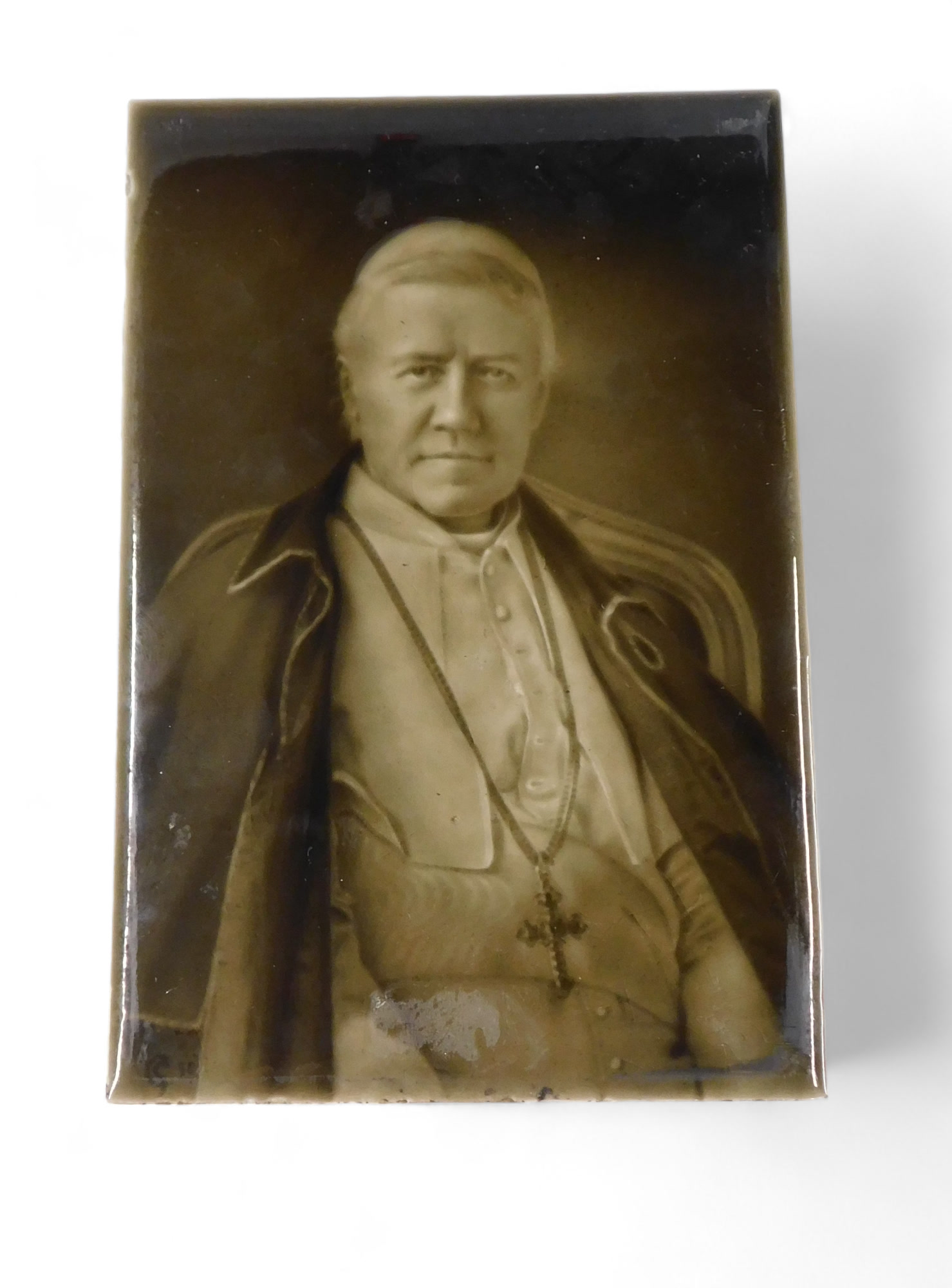 A Sherwin & Cotton ceramic tile, of Pope Pius X, dated 1904.