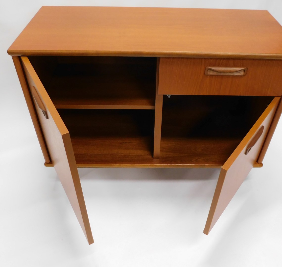 A 1960s/70s teak side cabinet, with one drawer, two doors, on square tapering legs, 76cm high, 102cm - Image 4 of 4