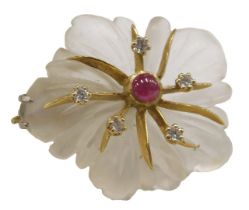 A rock crystal semi and precious stone set flower shaped pendant, 4cm high, on an 18ct gold frame se