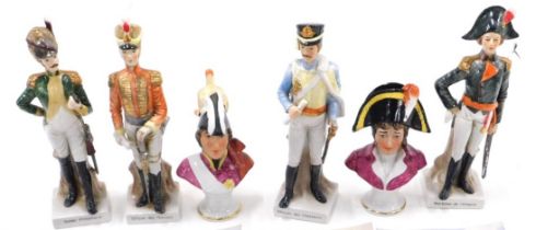 A set of four porcelain figures of gentleman wearing a French military uniform, and a pair of busts