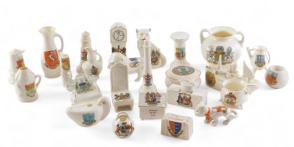 A quantity of crested china, to include a Great Yarmouth sports bag, cats, boat, longcase clock, a G