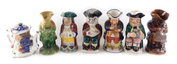 A collection of 19thC and later Toby jugs, to include treacle glazed Majolica type Allertons, etc. (