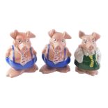 Three Wade NatWest piggy banks, comprising Daughter, Father and Mother, with two stoppers. (3)