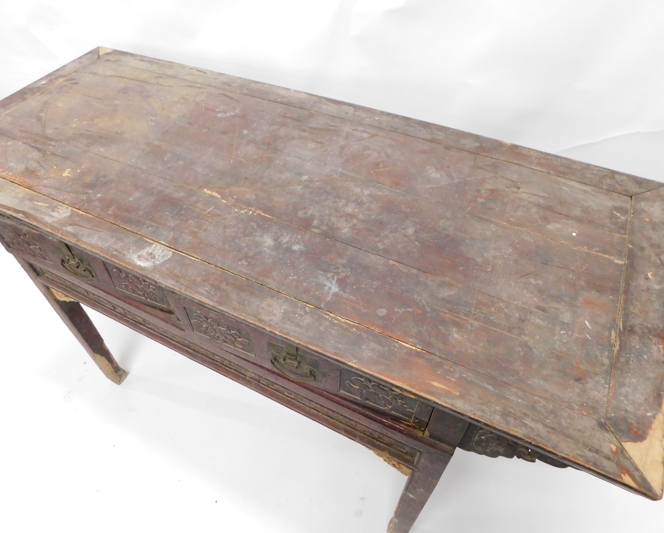 A Chinese red stained altar table, of planked top, with two carved frieze drawers with brass handles - Image 2 of 2