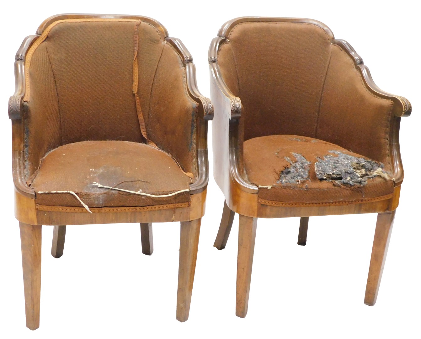 A pair of Continental Biedermeier style walnut tub chairs, each with a moulded show frame, a veneere