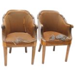 A pair of Continental Biedermeier style walnut tub chairs, each with a moulded show frame, a veneere