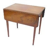 An early 19thC mahogany Pembroke table, the rectangular top with rounded corners and a moulded edge,