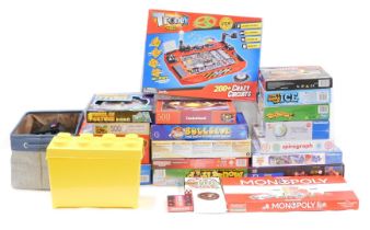 A quantity of boxed jigsaws, Super Mario game, Monopoly, Mario Kart game, Buckaroo, Tronex, etc.