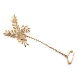 A 9ct gold fern brooch, the fern spray with applied cultured pearls and bow drop, on single pin back