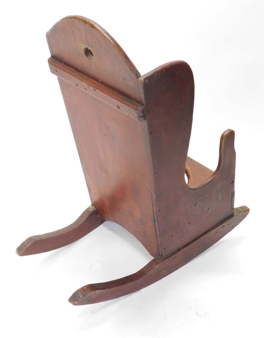 A 19thC country made child's red stained pine commode rocking chair, with shaped back. - Image 2 of 2