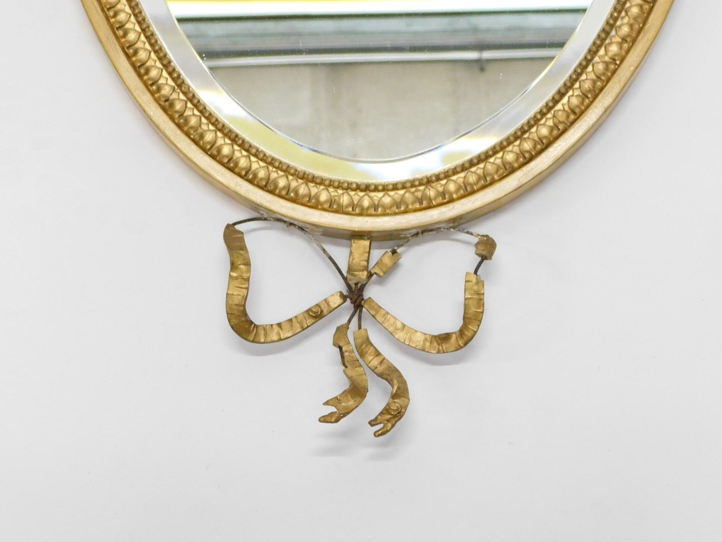 A late 19th/early 20thC oval wall mirror, in Adam style, the frame decorated with swags and leaves, - Image 3 of 3