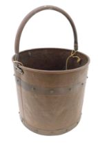 A copper and brass coopered coal bucket, with swing handle, 52cm high.