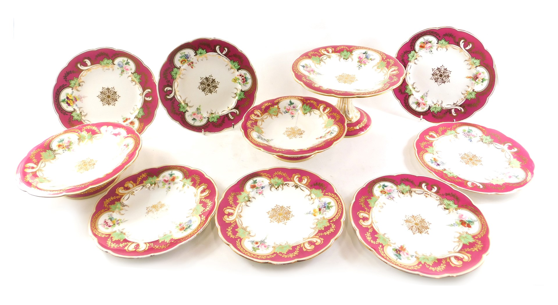 A 19thC porcelain dessert service, with puce border, painted with flower sprays, picked out in gilt,