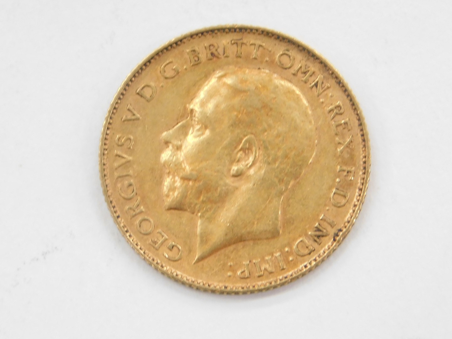 A George V half gold sovereign, dated 1911. - Bild 2 aus 2