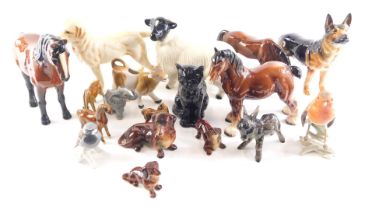 A quantity of ceramic animals, to include Goebel donkey, German Shepherd, Sylvac cat, etc. (2 small