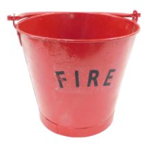 A red painted galvanised fire bucket, with swing handle, 46cm high. Buyer Note: VAT payable on the