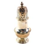 A small Edwardian silver sugar castor, of Queen Anne style design, 11.5cm high, Chester 1901, makers