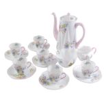 A Shelley Wild Flowers pattern coffee service, with cream floral ground with pink border, comprising